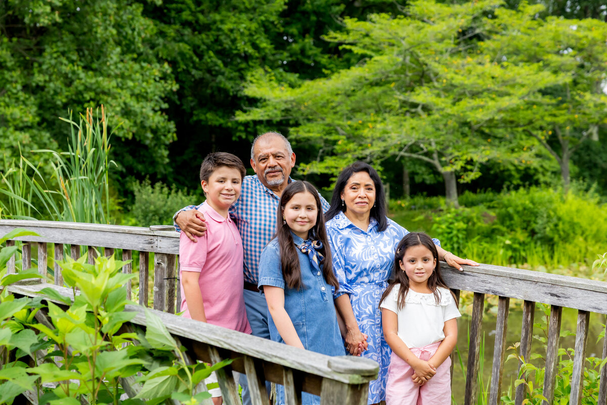 Multi-generational family portrait with grandparents, parents, and children, captured by Capture Joy Photography, Northern Virginia family photographer.
