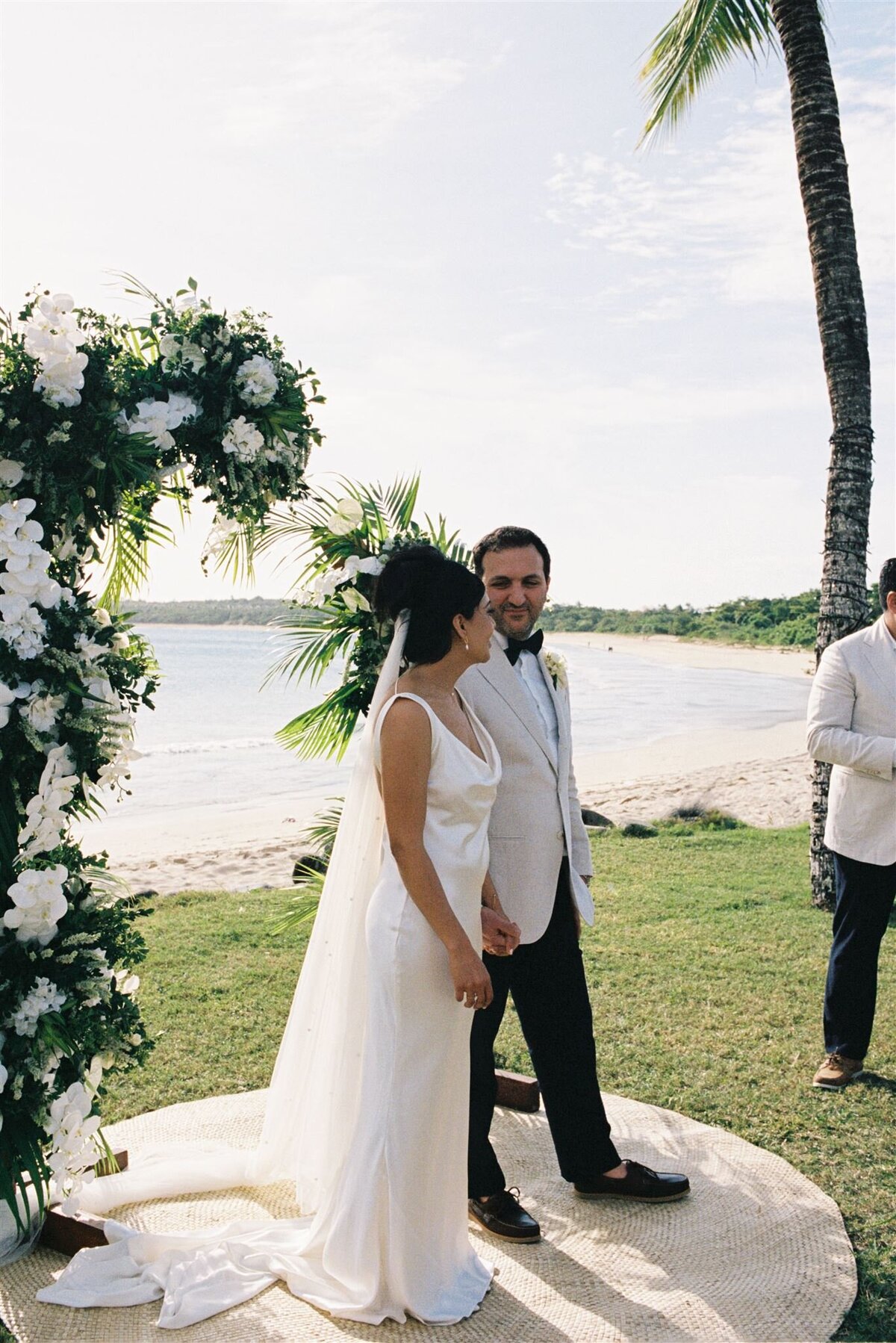 couple during wedding ceremony at fiji intercontinental on 35mm film