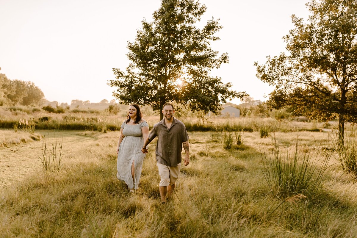 sunset-couples-walk-field-session-ada-hayden-heritage-park-ames-iowa-storyteller-collective-photo-co