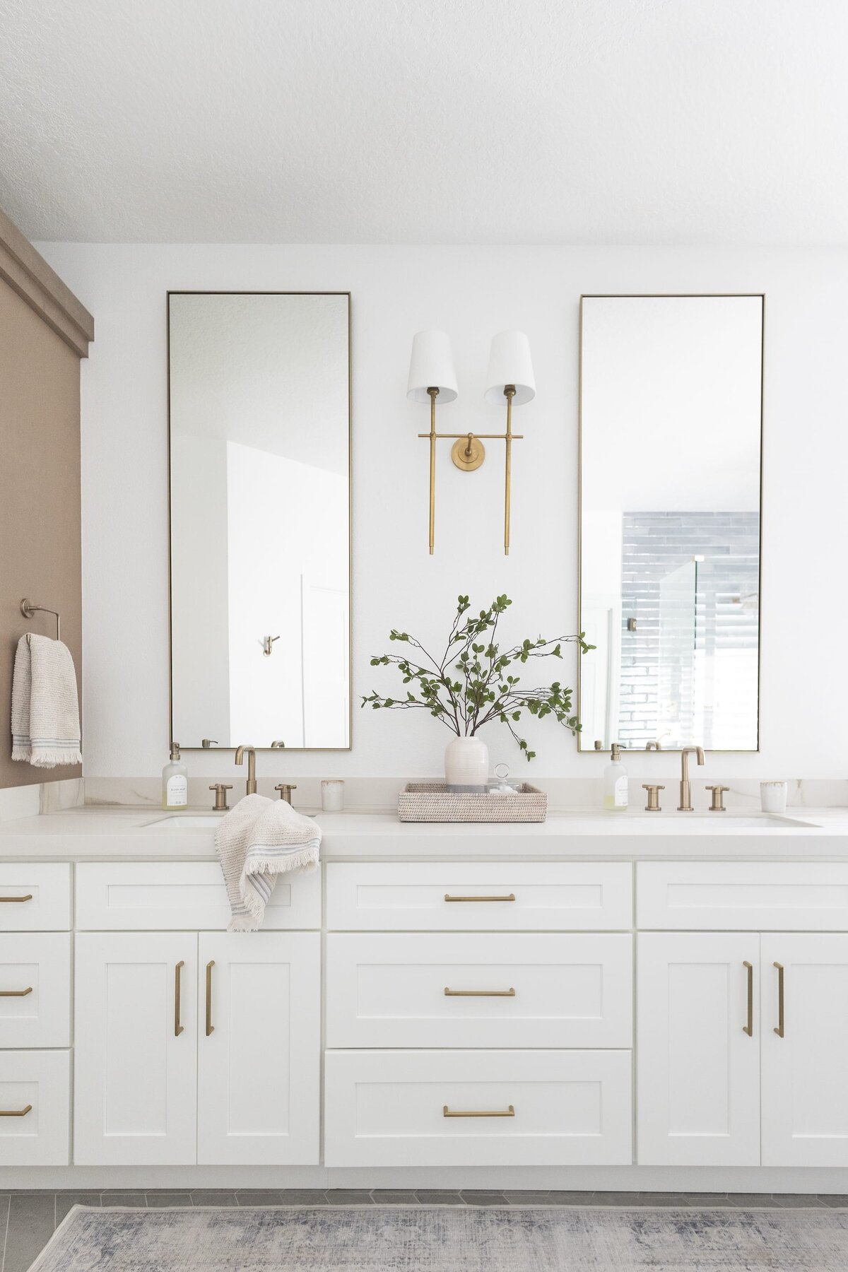 dewine design orlando interior designer contemporary coastal primary bathroom white vanity with long rectangle mirrors and double sinks