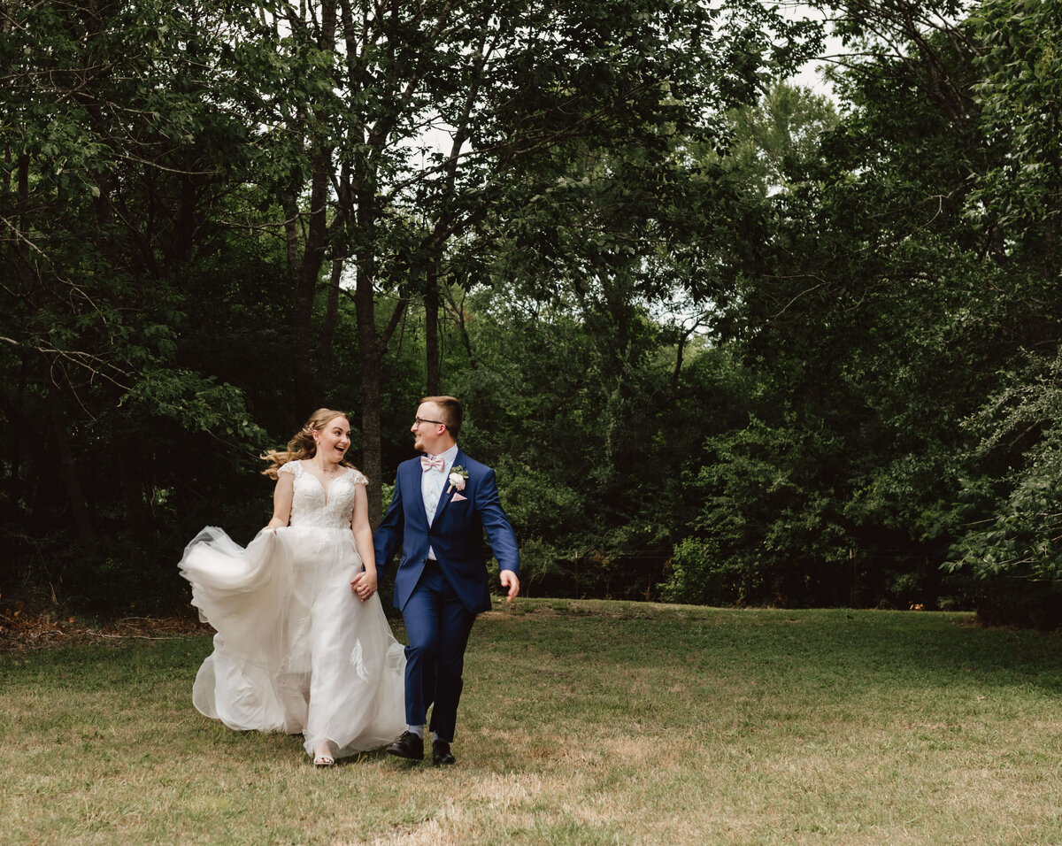 bride & groom frolic outside privately after intimate ceremony