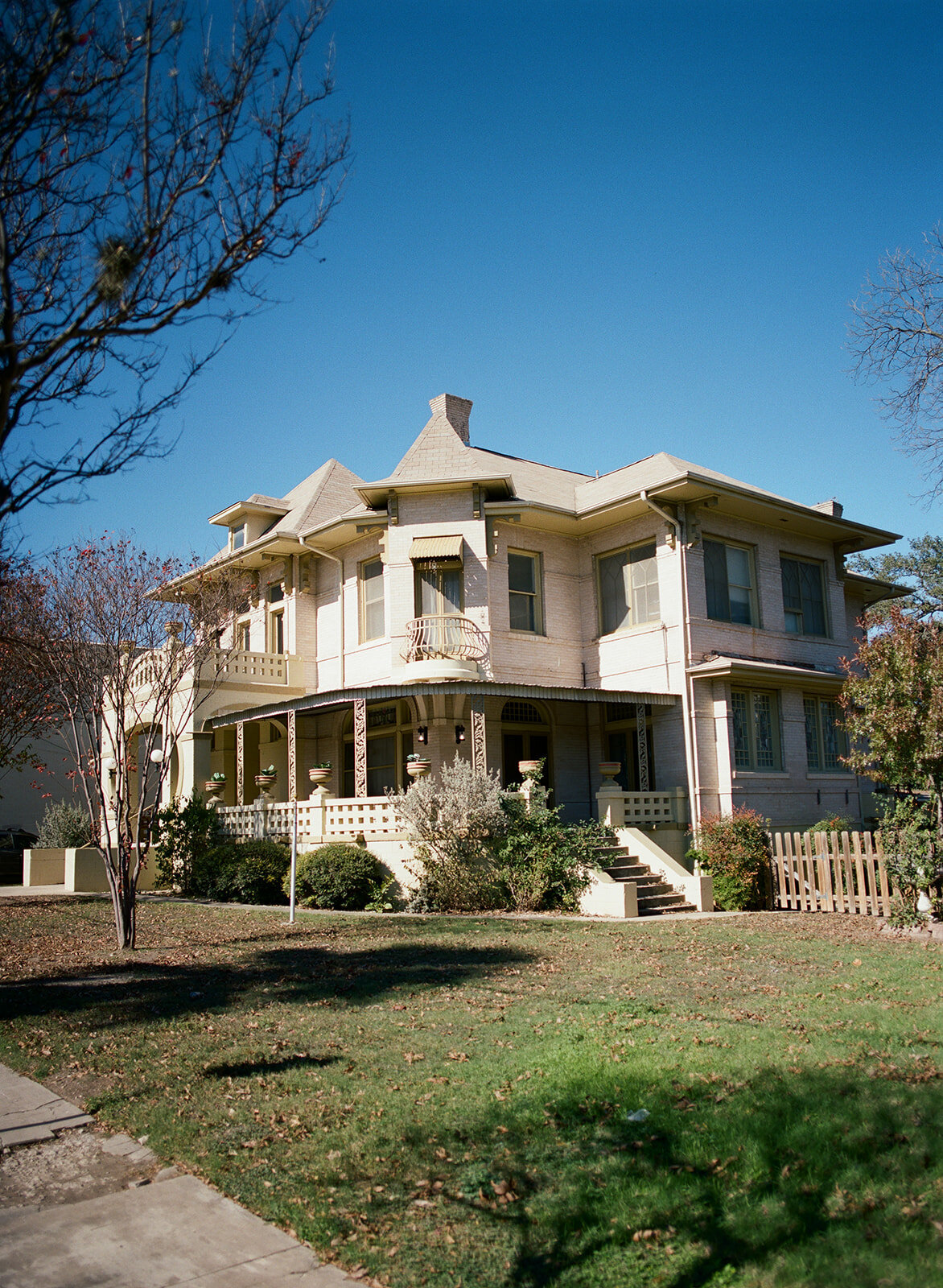 Exterior of a grand estate wedding venue in San Antonio, Texas with elegant natural light and editorial architecture