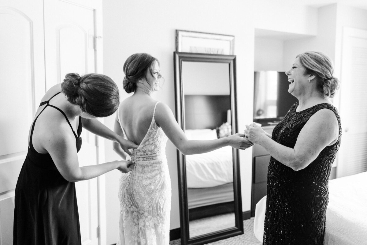 bride-getting-ready-with-mom-sister