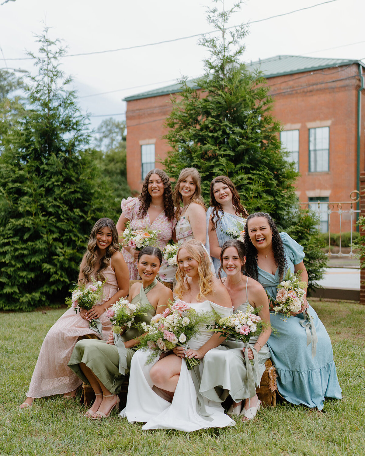 Bride and bridesmaids with bouquets designed by Abby Grace Florals at Easley SC wedding