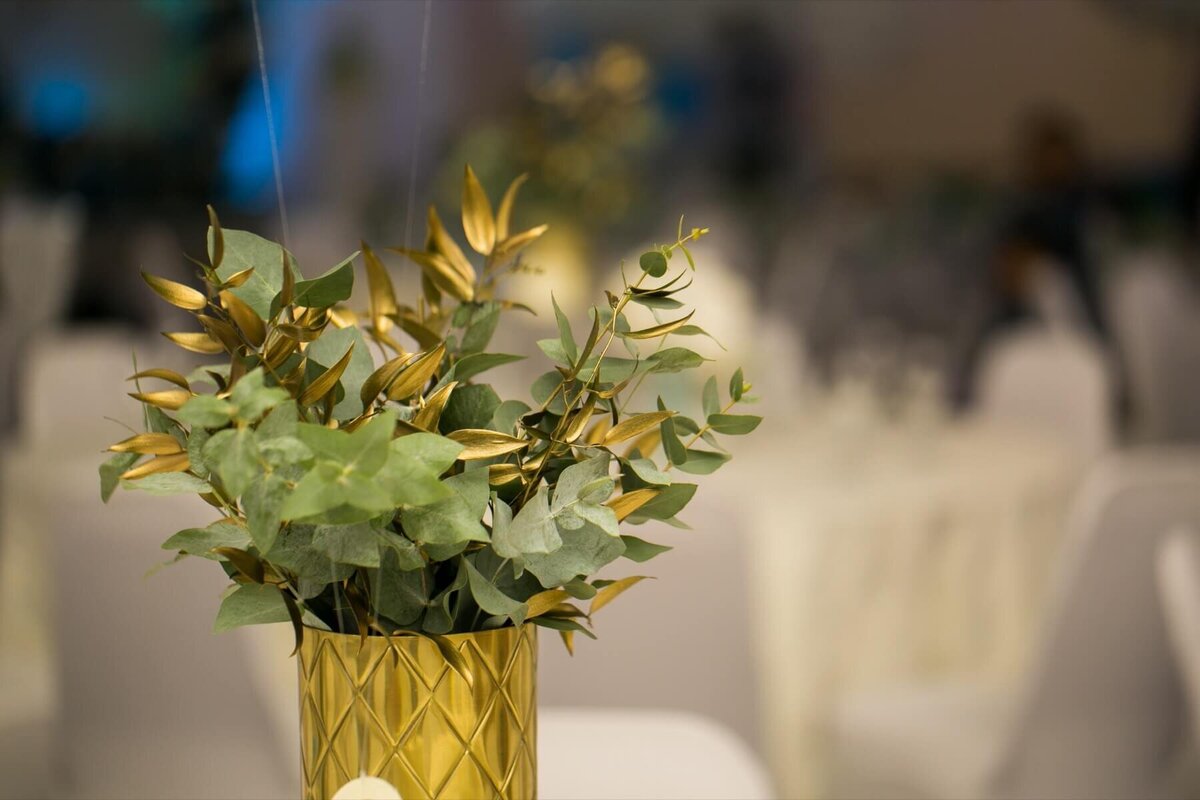 Small gold votive with green and gold leaves