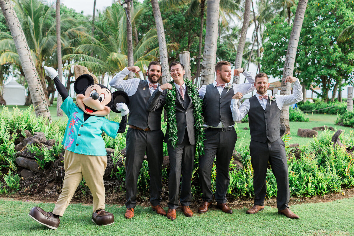 Groomsmen with Micky mouse at Disney wedding