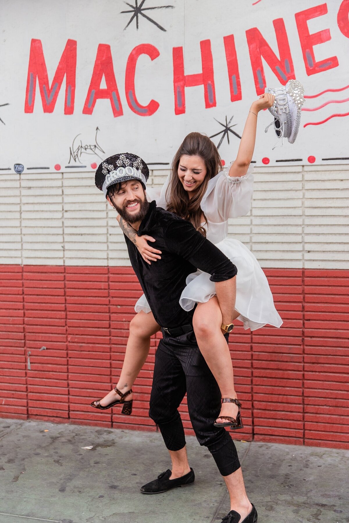 bride rides groom with hats