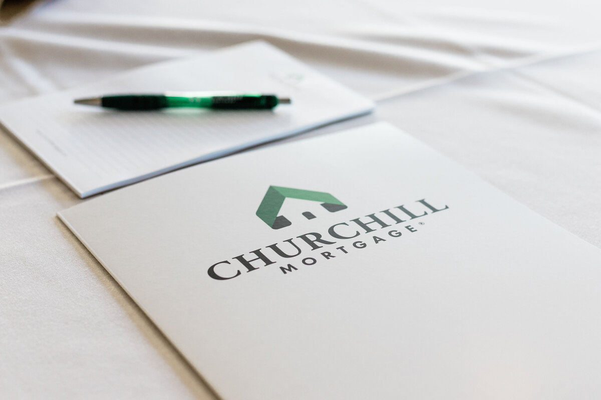 close up of a Churchill Mortgage folder