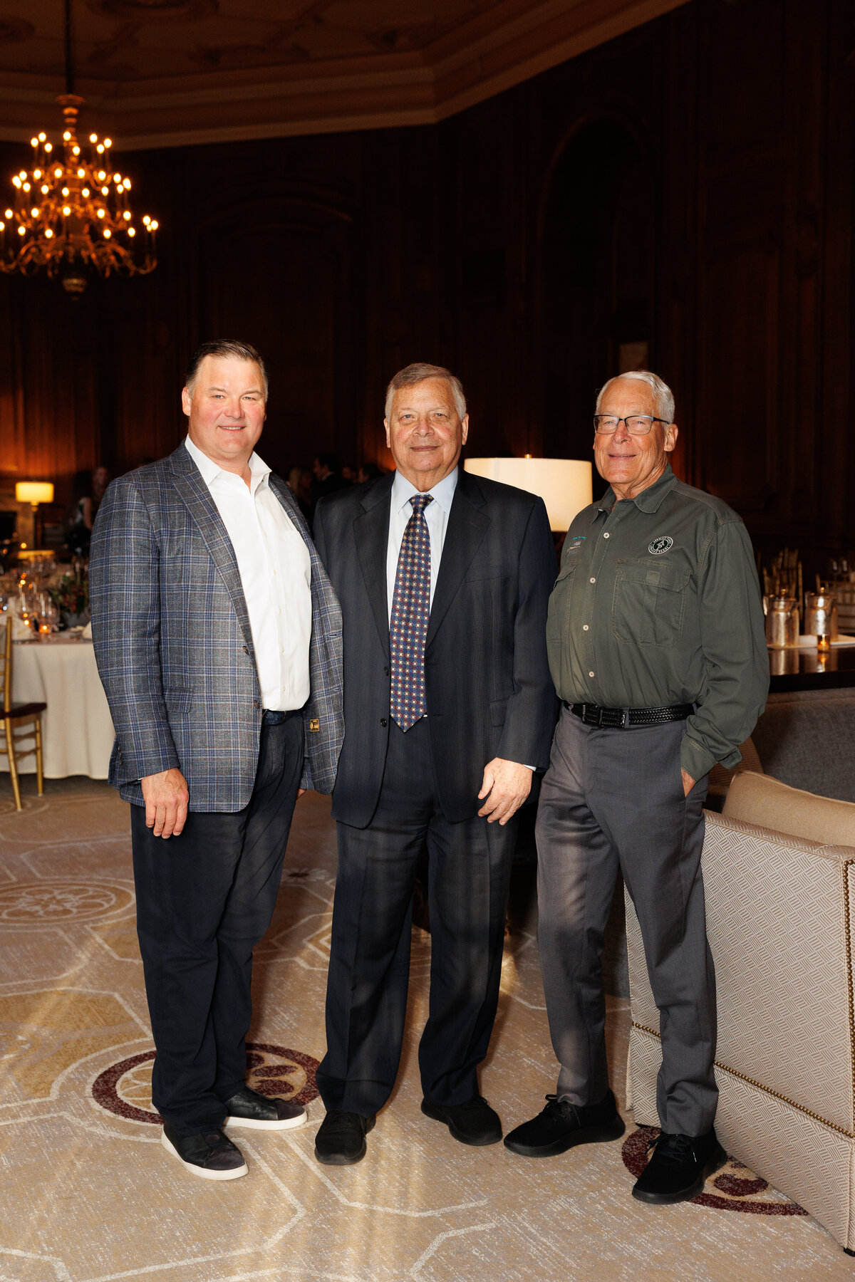 Three males standing