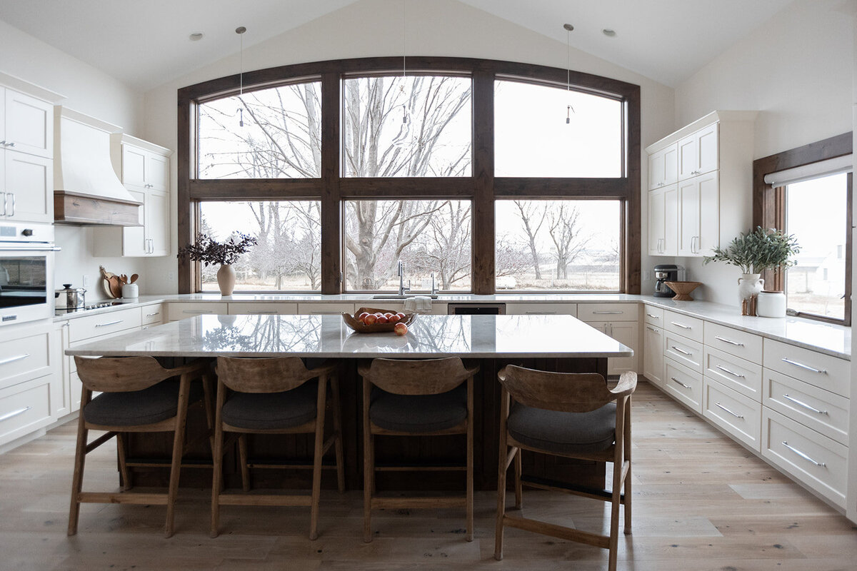 michele rosenboom design clean country renovation large island windows with wood trim