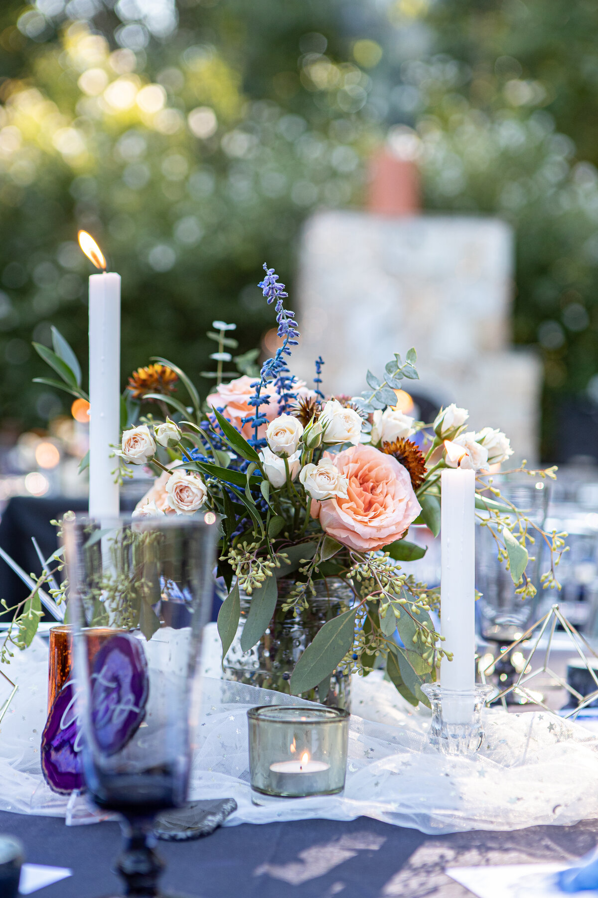 Elegant evening baby shower tablescape with candlelight and blue linens in Sparta, NJ.

