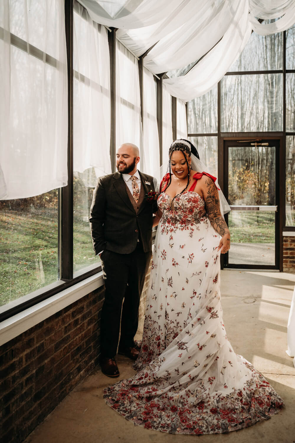 COuple stands in Lodge wedding venue in Ohio with earth tioned aesthetic