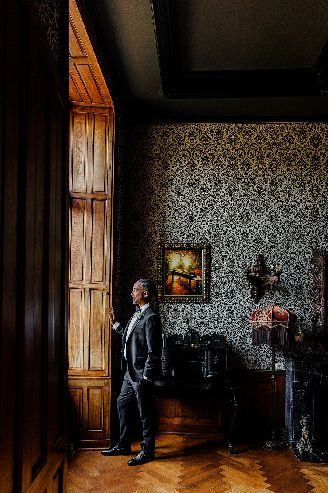Elegant groom captured naturally during a romantic Loire Valley elopement