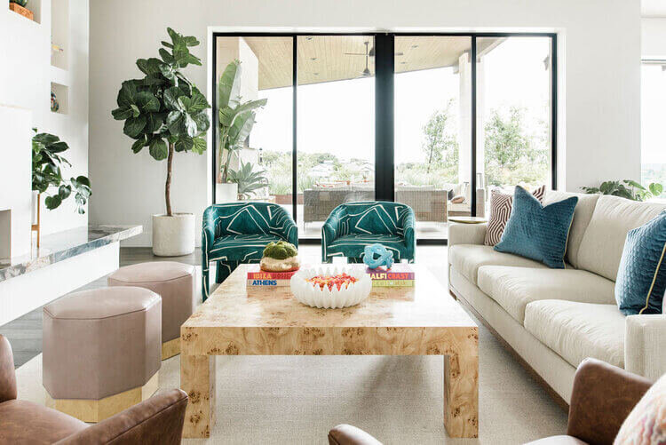oyster creek studios austin barton creek leather stools with wooden coffee table and ivory couch