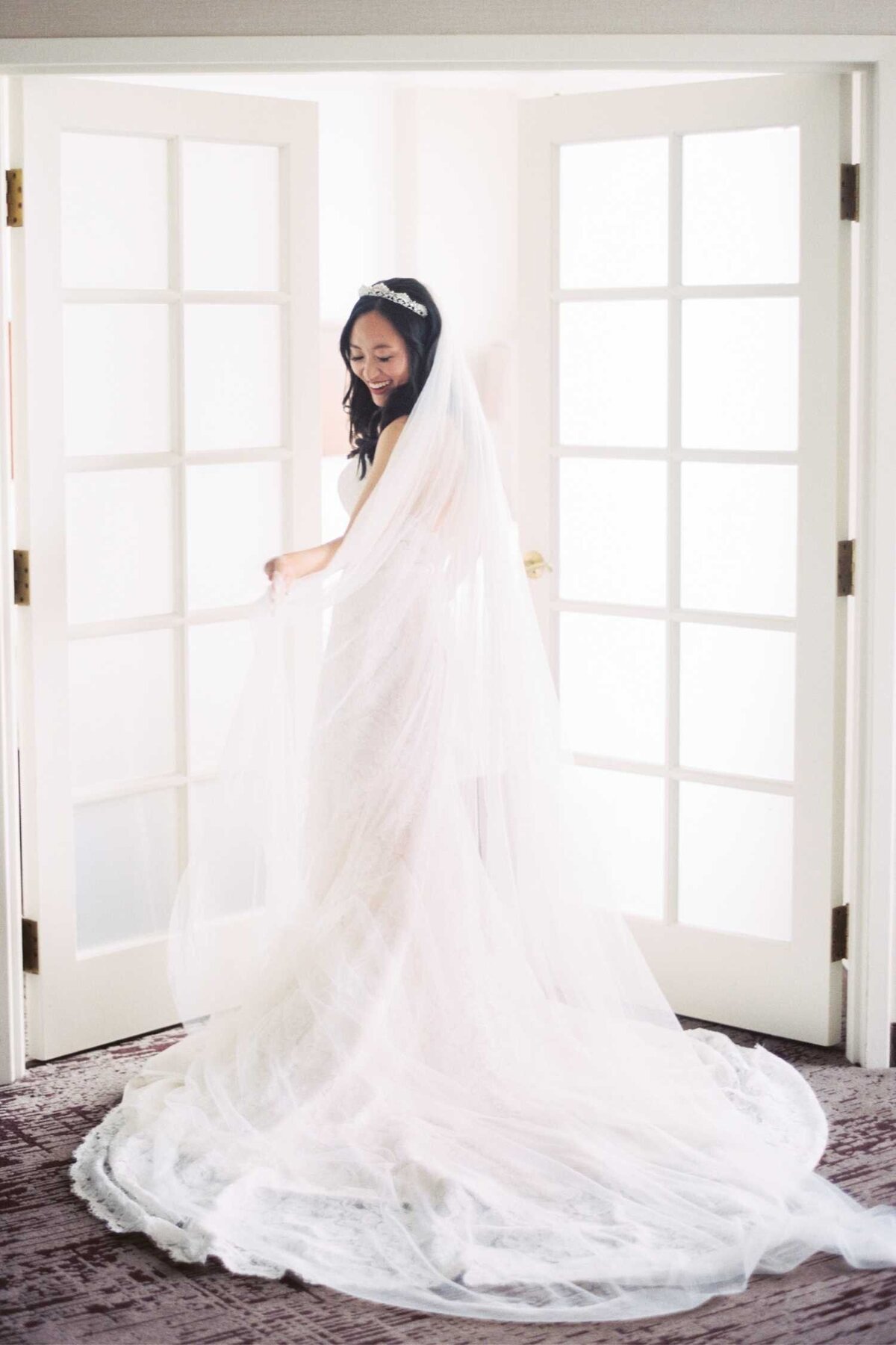 Bride with dress and veil at Luxury Chicago North Shore Garden Wedding Venue