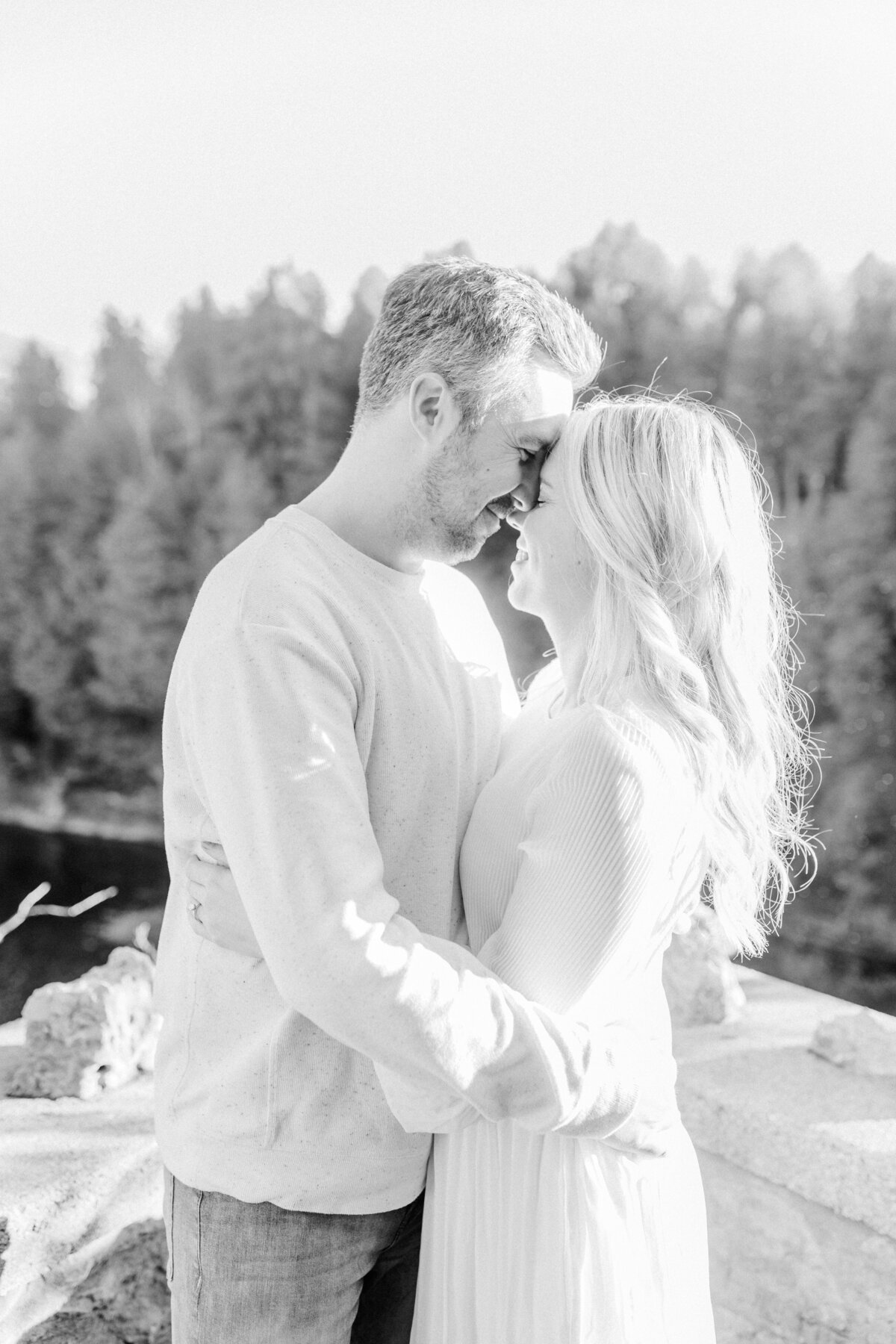 Elora Mill's majestic stone façade, a timeless backdrop for romantic engagement moments filled with light and history