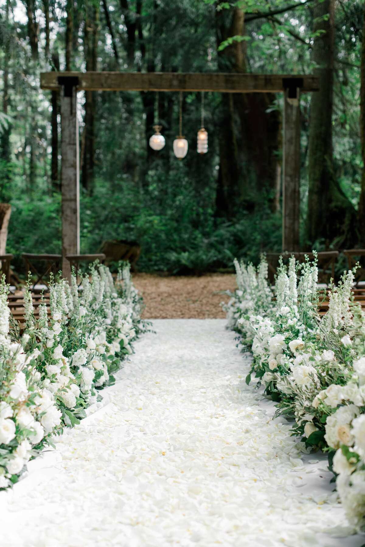 Stunning flower-lined wedding ceremony aisle