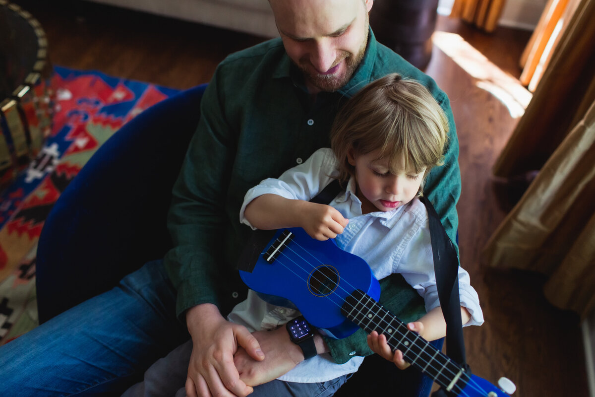 Father and son spending time together at home