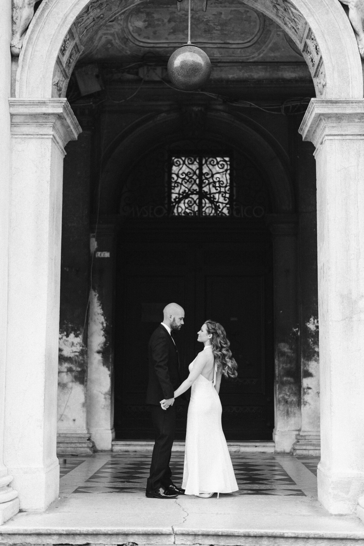 Venice Engaged Couple in Venice Italy hugging