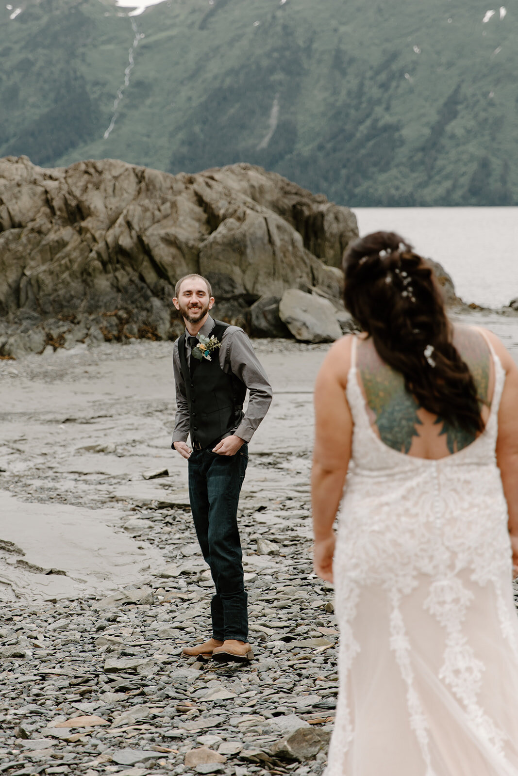 Elopement couple shares first look on Turnagain Arm Alaska.