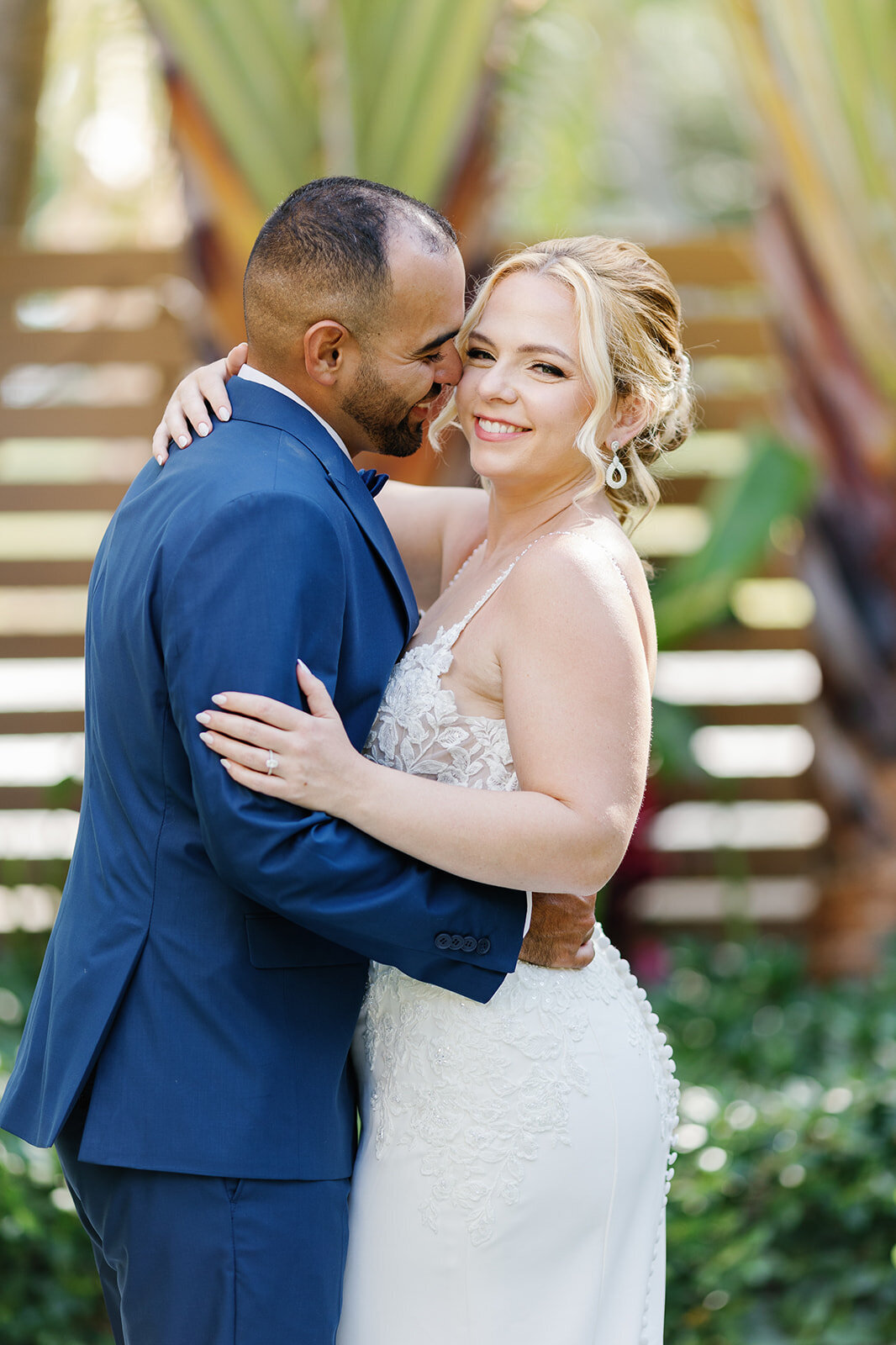 Romantic newlywed moment between Kelly and Rafael at La Siesta Marina.