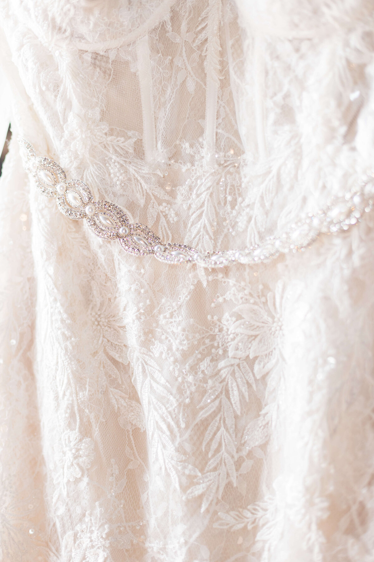 Lace wedding dress designed by Melissa Sweet