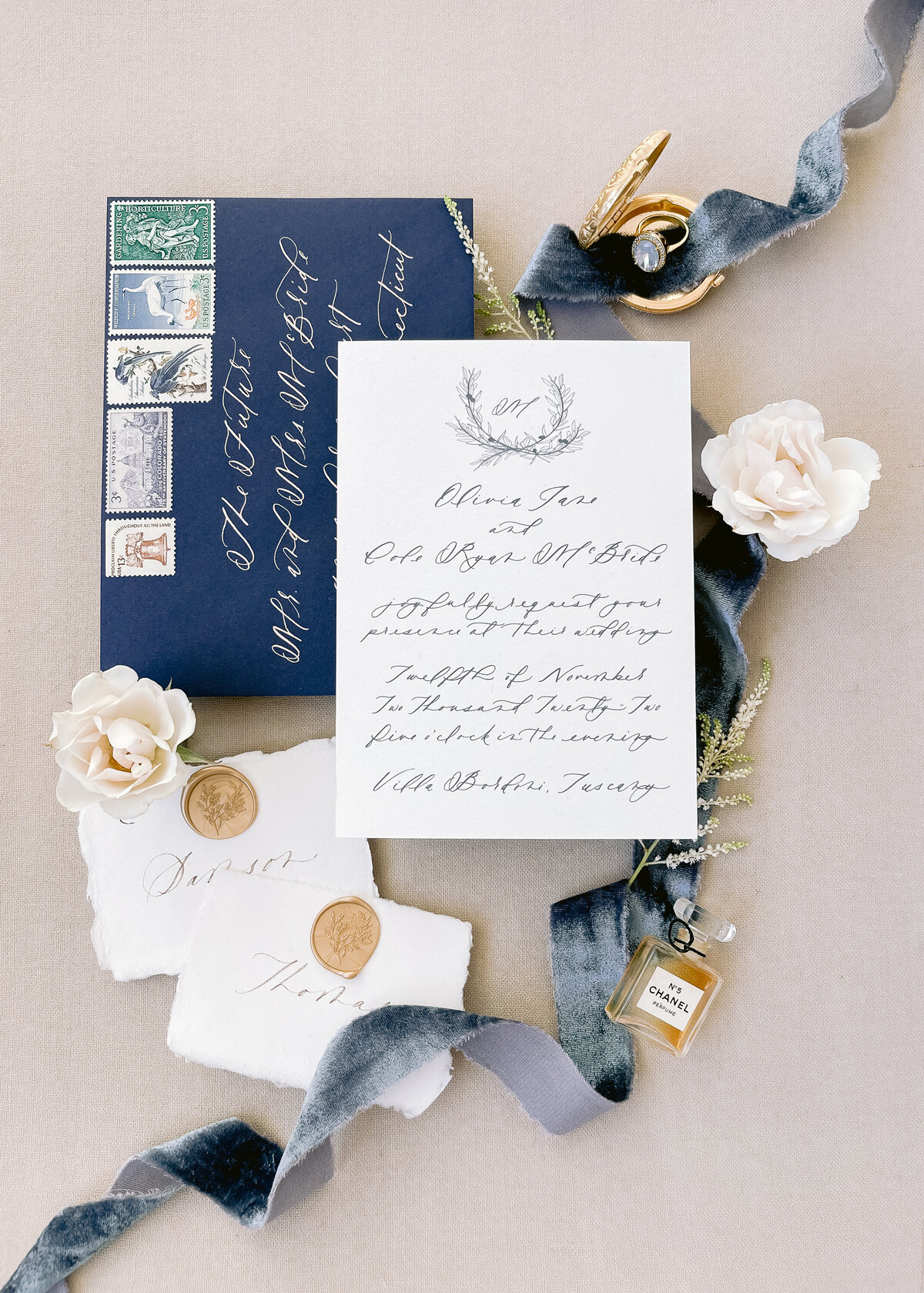 Cotton cardstock wedding invitations with navy envelope, custom calligraphy, place cards, and wax seals