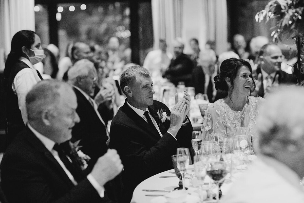 parents watching weddnig toast