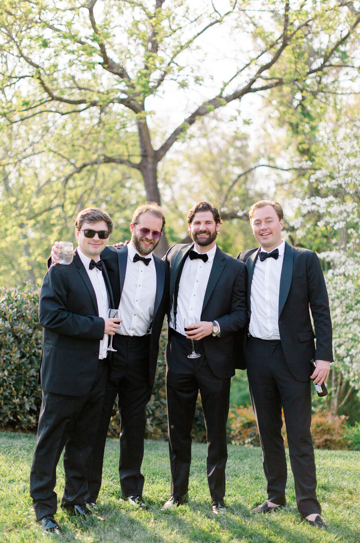 Guests in tux's during cocktail hour at The Clifton.