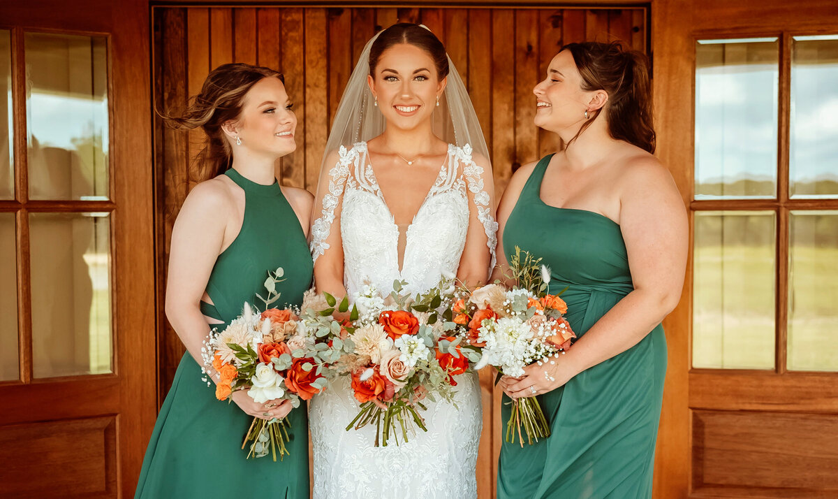 Bride with bridesmaids photos at wedding 