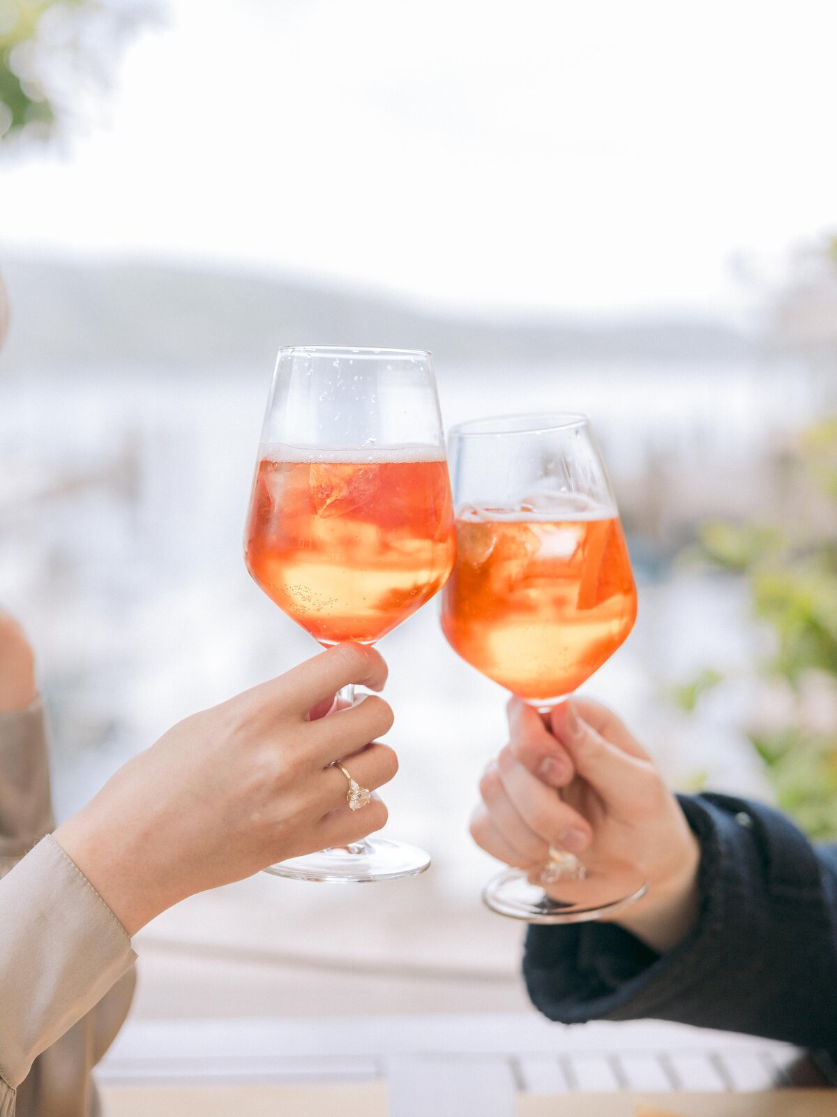 lake-garda-elopement-italy-danielle-robidoux-photography-aperol spritz-cheers-engagement-session-4059