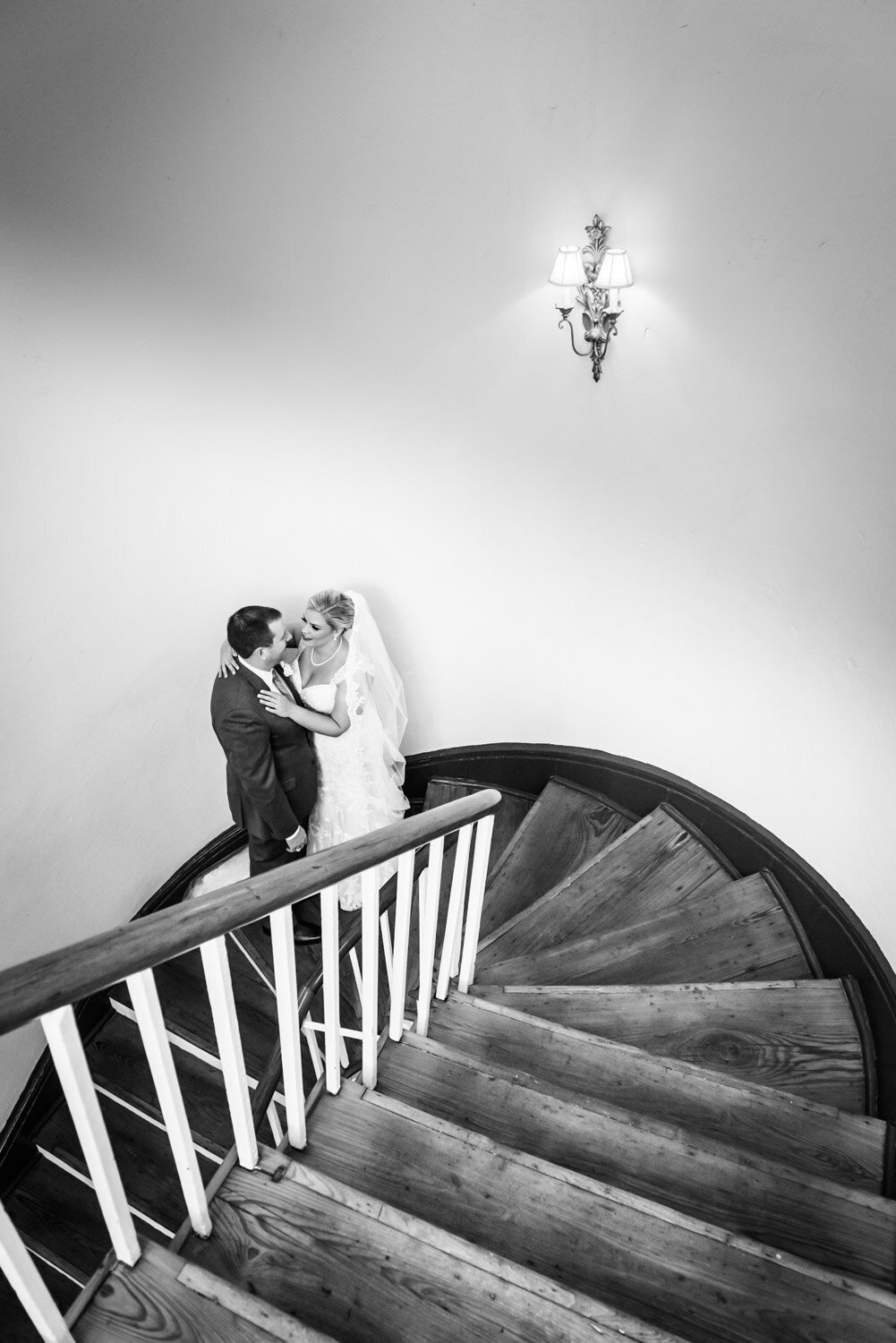 Bride and groom on stairs