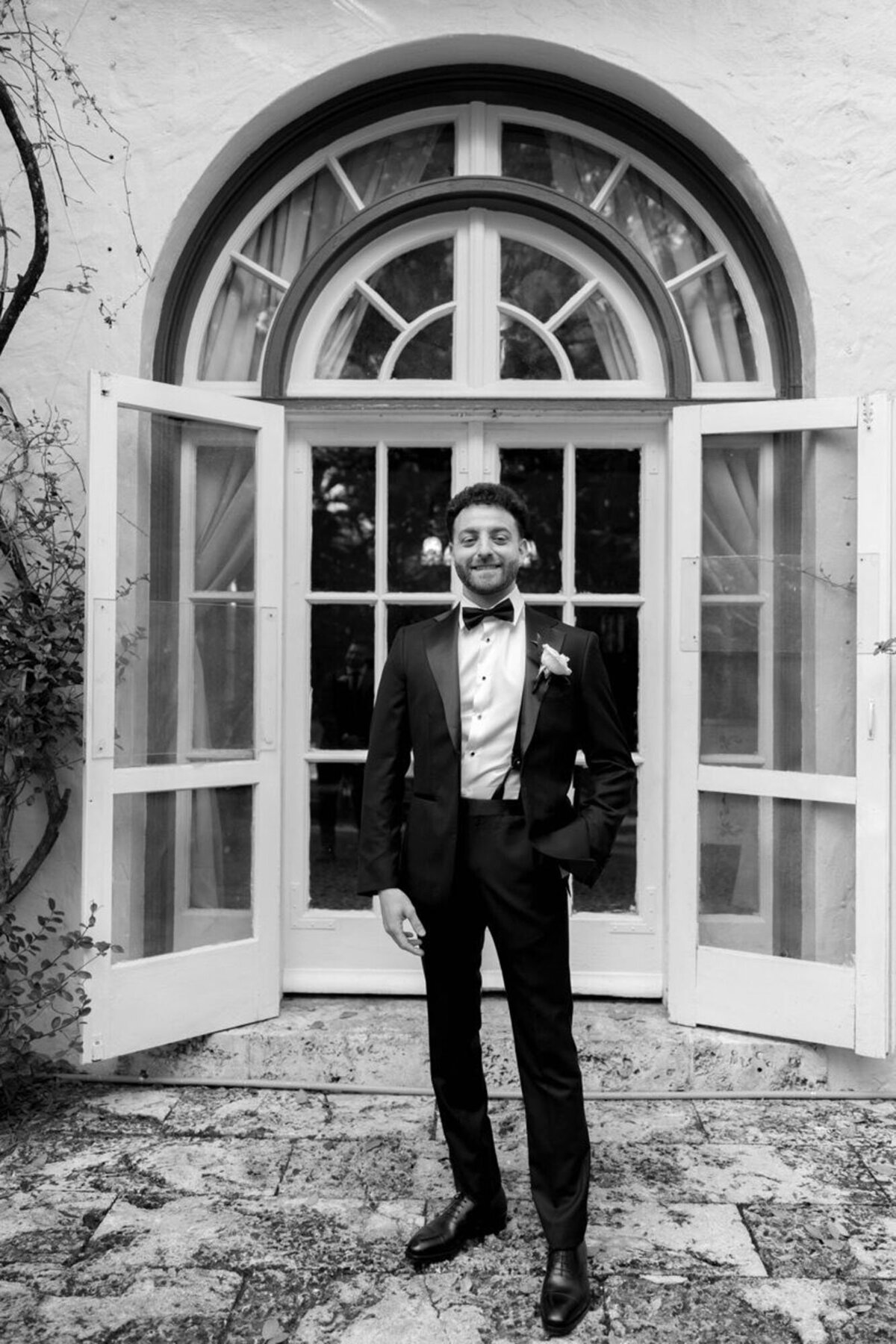 Black and white groom portrait by one of the top wedding photographers in orlando florida, Marissa Nicole