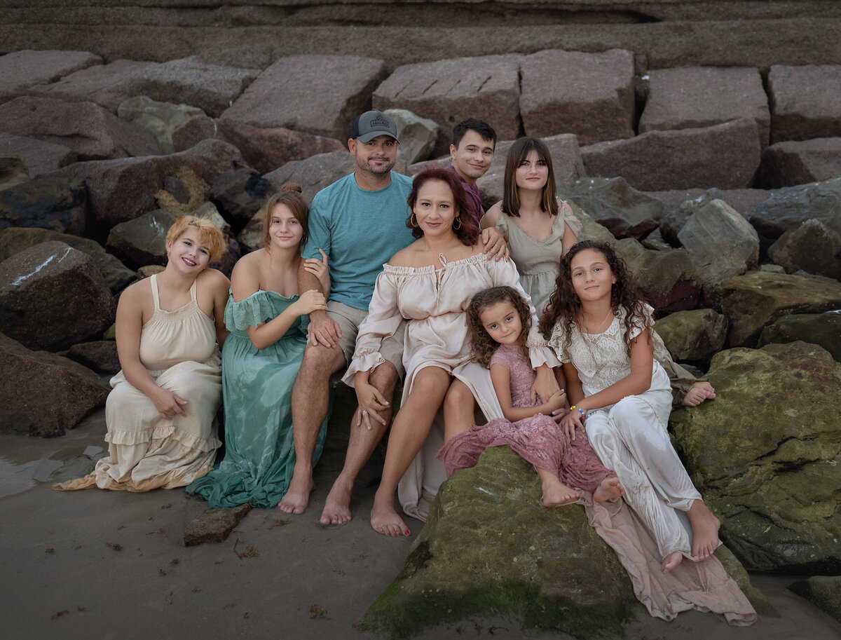 Danbury-family-on-rocks-in-dresses