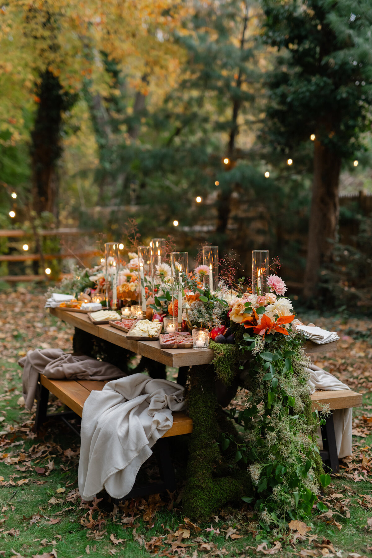 Fall-inspired tablescape with candles and flowers