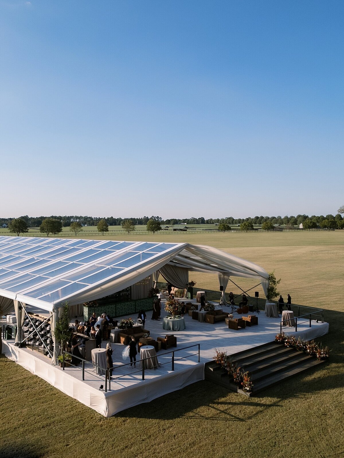 Custom tented wedding celebration with fall Ralph Lauren vibes at private polo farm in Aiken, South Carolina by Sarah Bradshaw_0190