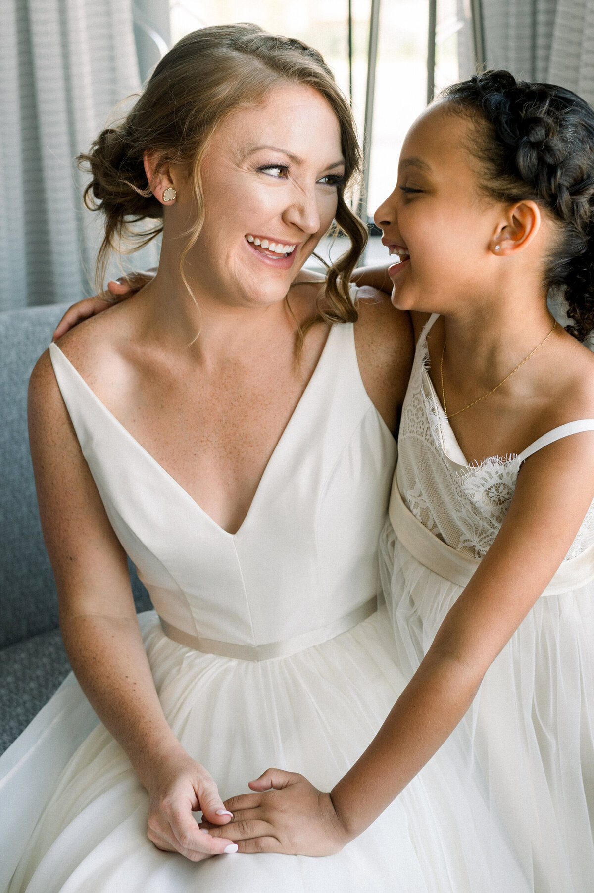 bride with flower girl at Uptown Charlotte wedding