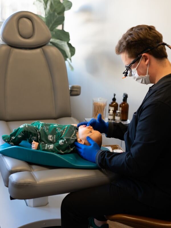 Infant tongue tie treatment