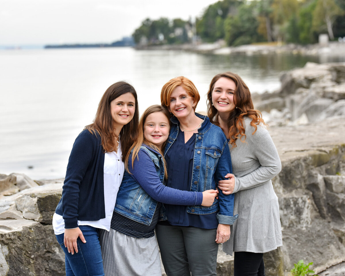 Mom and daughters outdoor waterfront portrait