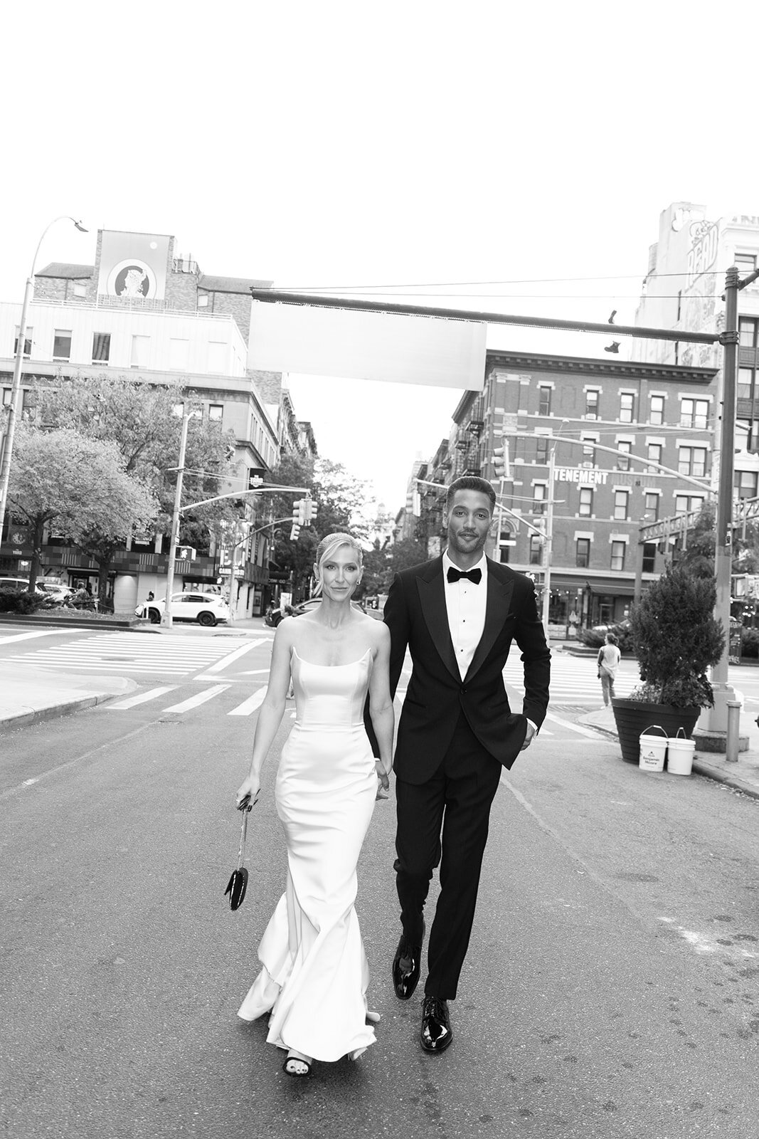 nyc couple hand in hand 