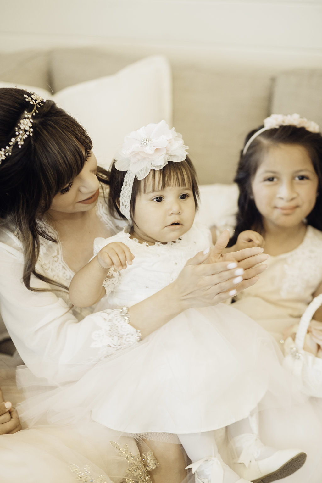 Wedding Photograph Of Woman Carrying a Toddler Los Angeles