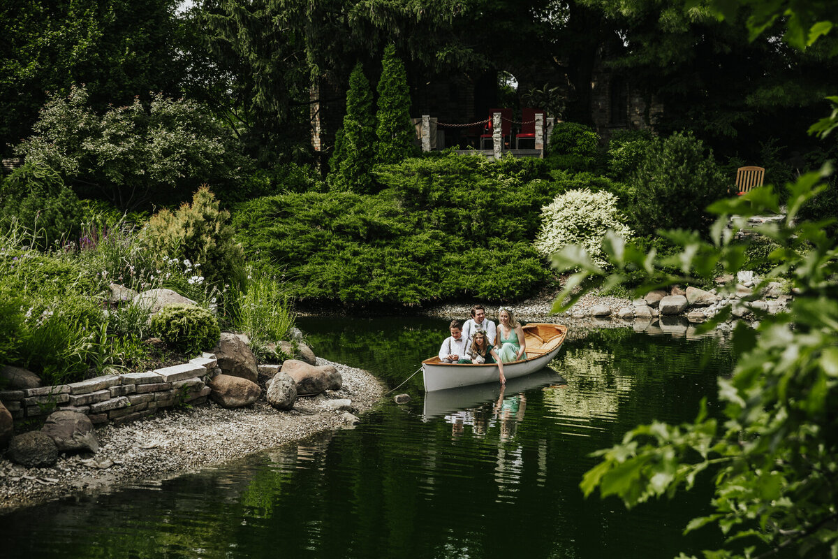 Family in a canoe at Hamstra Gardens in Wheatfield, IN