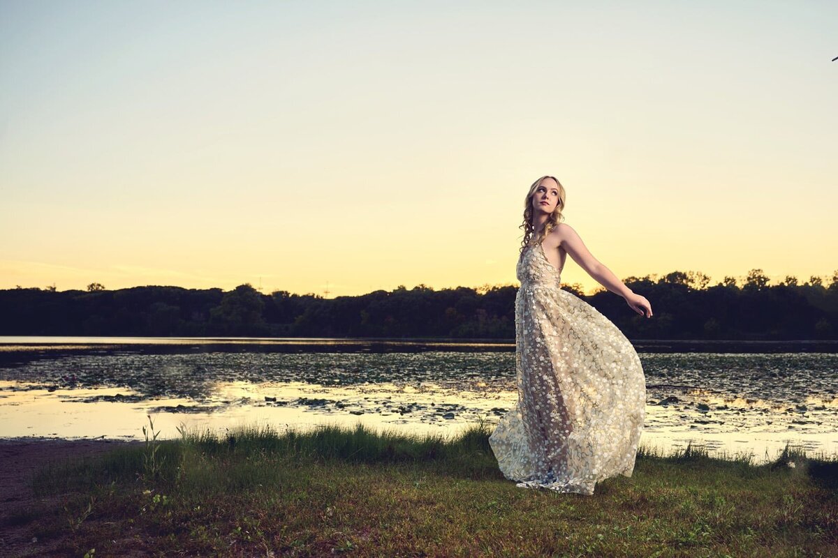 Senior Picture Photographer Captures Elegant Sunset Portrait by the Water-89
