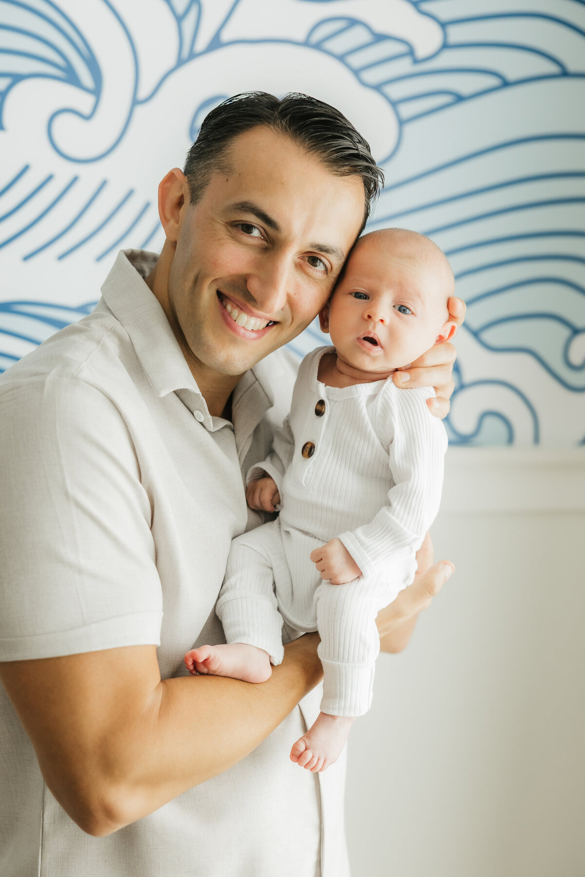 dad-with-newborn-baby