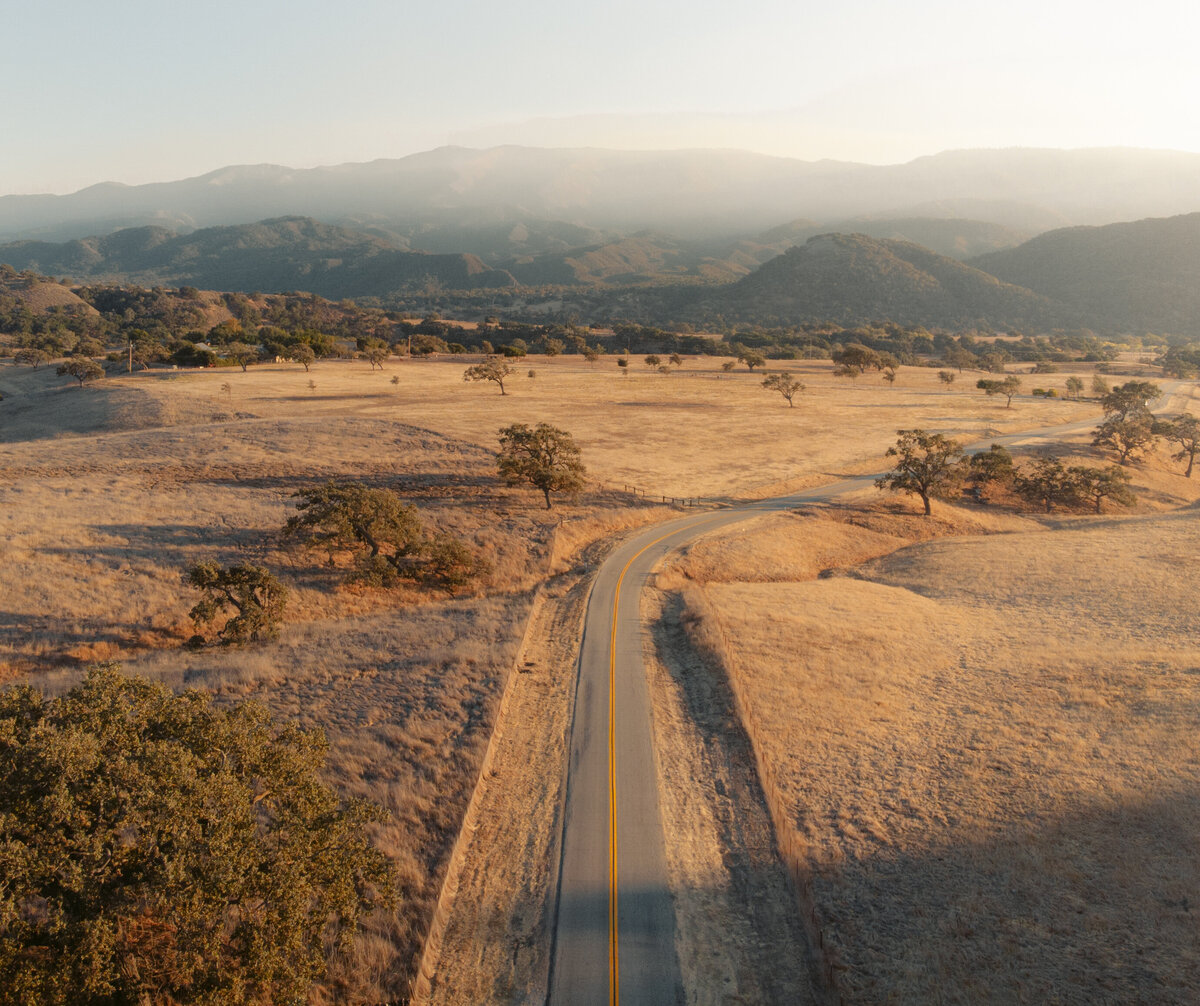Landscape photo of California's central coast road and rolling hills