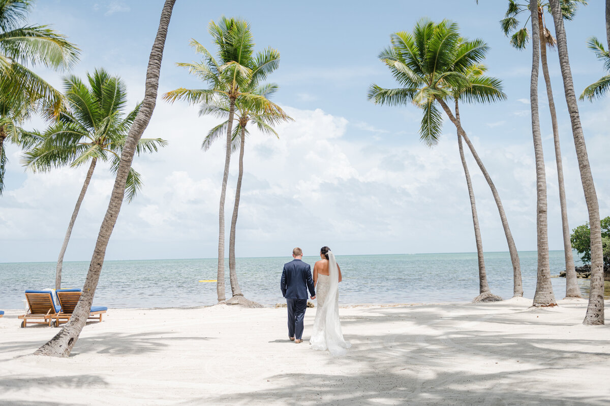 coastal beach wedding portraits of bride and groom