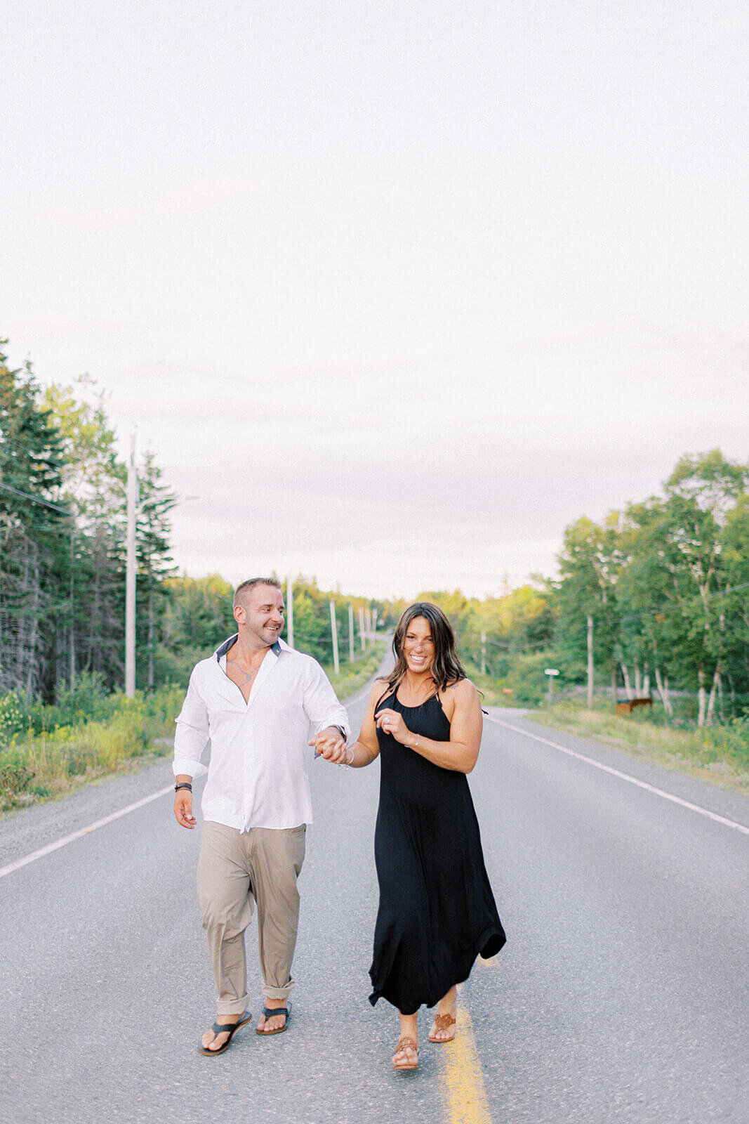 man-and-woman-walk-on-road