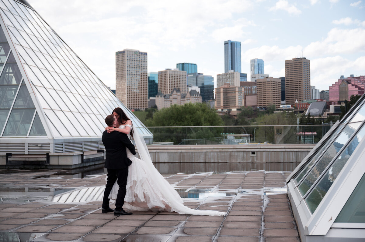 bride and groom outside of the Muttart Conservatory in Edmonton