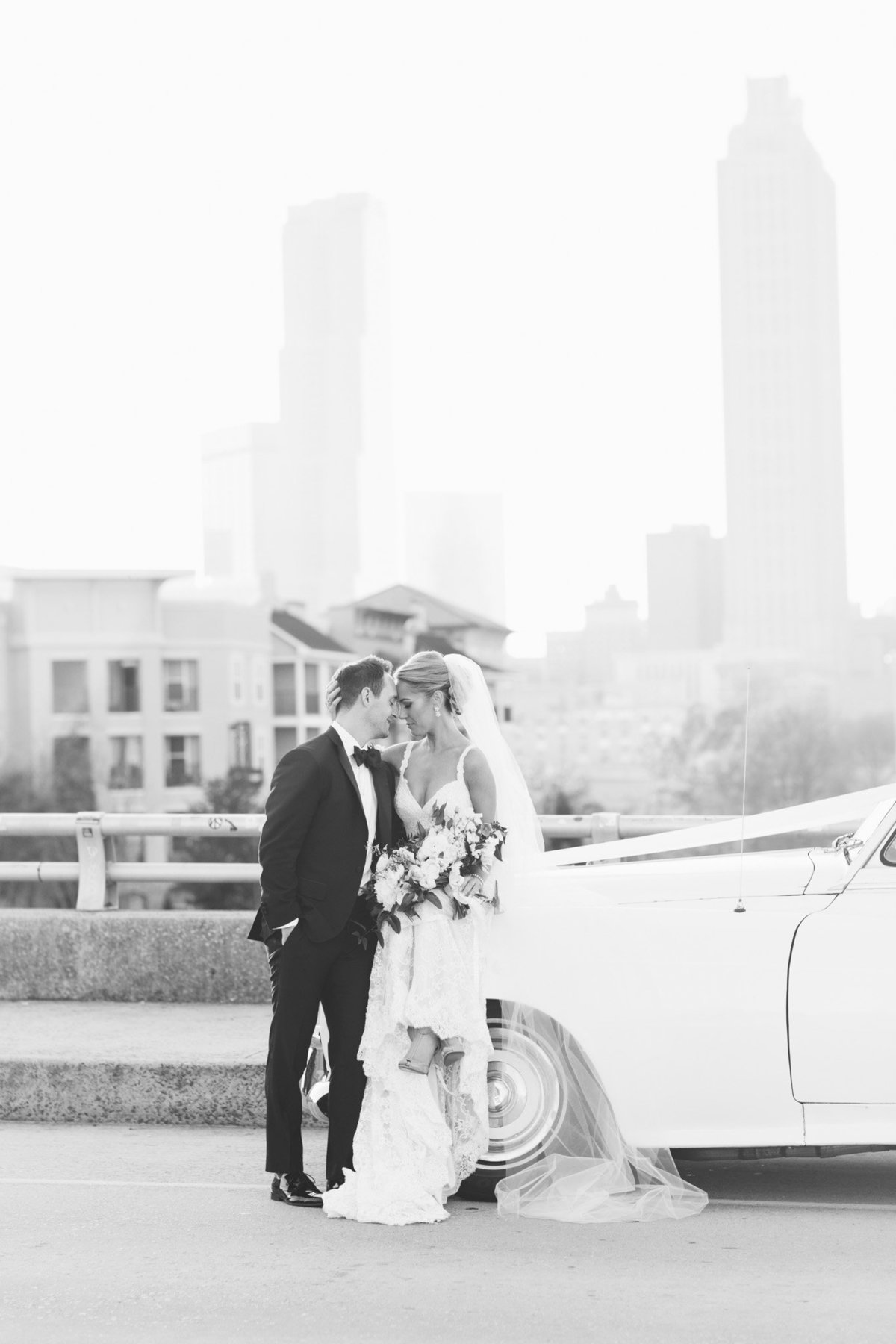 Romantic Atlanta skyline wedding photos by destination photographer Rebecca Cerasani.
