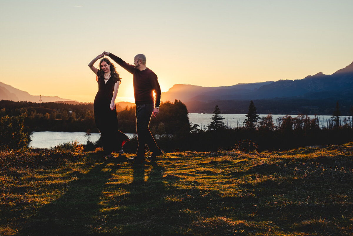 couple dancing at sunset